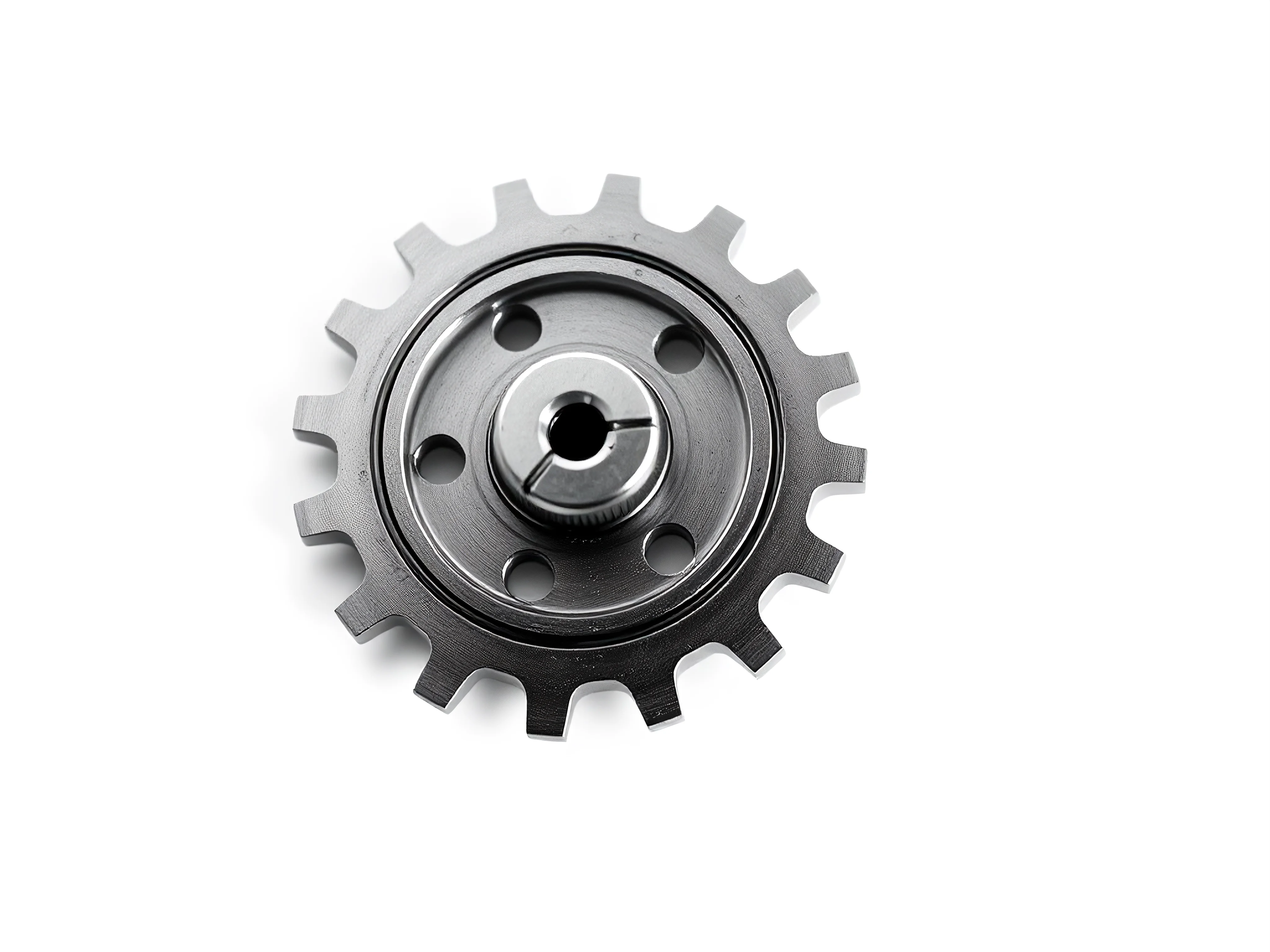 Close-up of a modern, gleaming miniature gear on a bright white background.